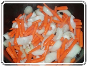 Baby Carrots and Onions Sauteing for Beef in Stout Recipe