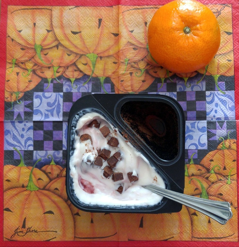 Muller Raspberry Brownie supreme yogurt with brownie pieces 