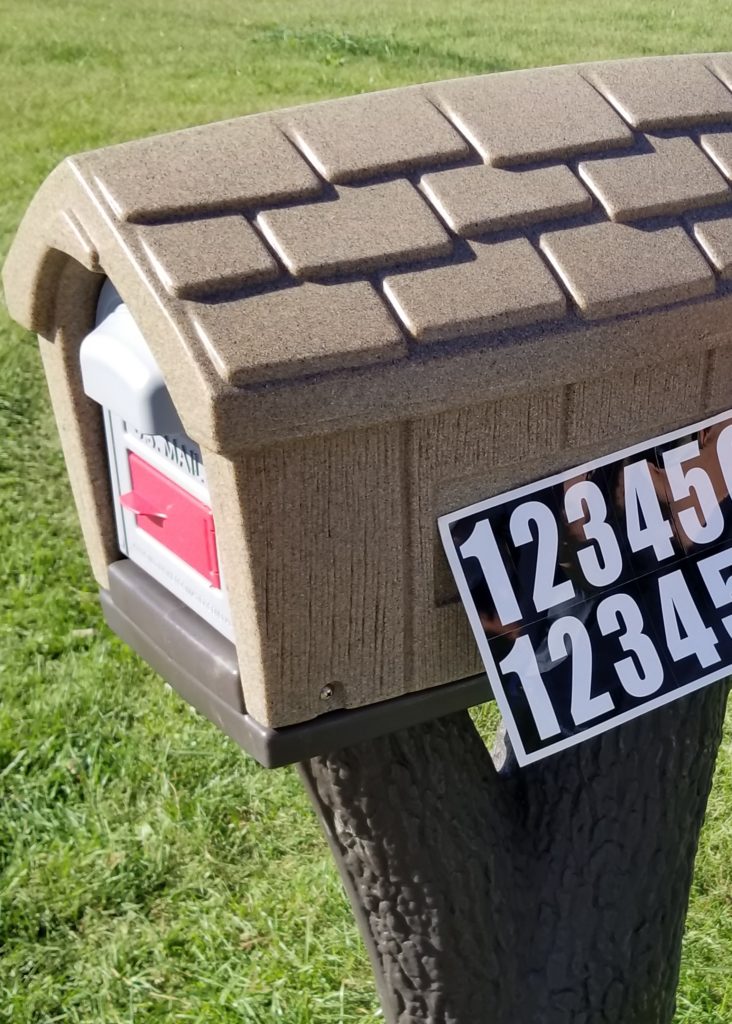 Add Country Charm to Your Driveway with a Rustic Mailbox